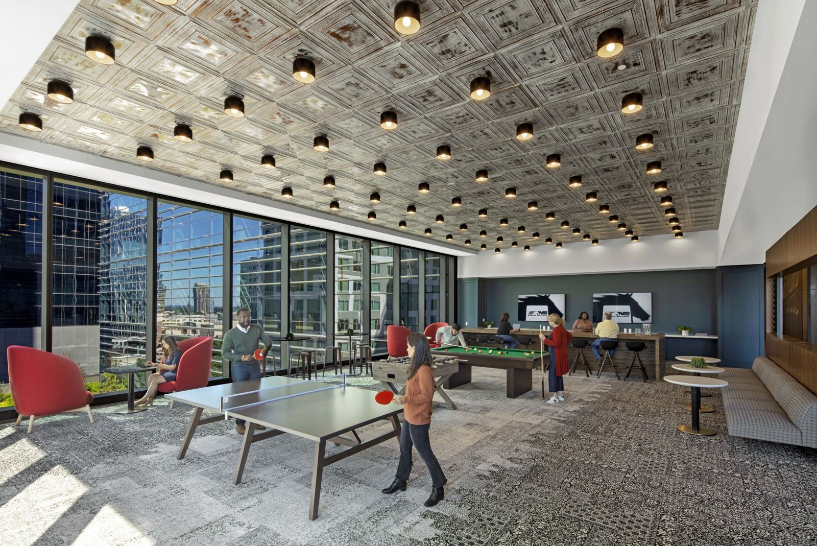 Norfolk Southern: Ping pong and billiard tables under a tin ceiling