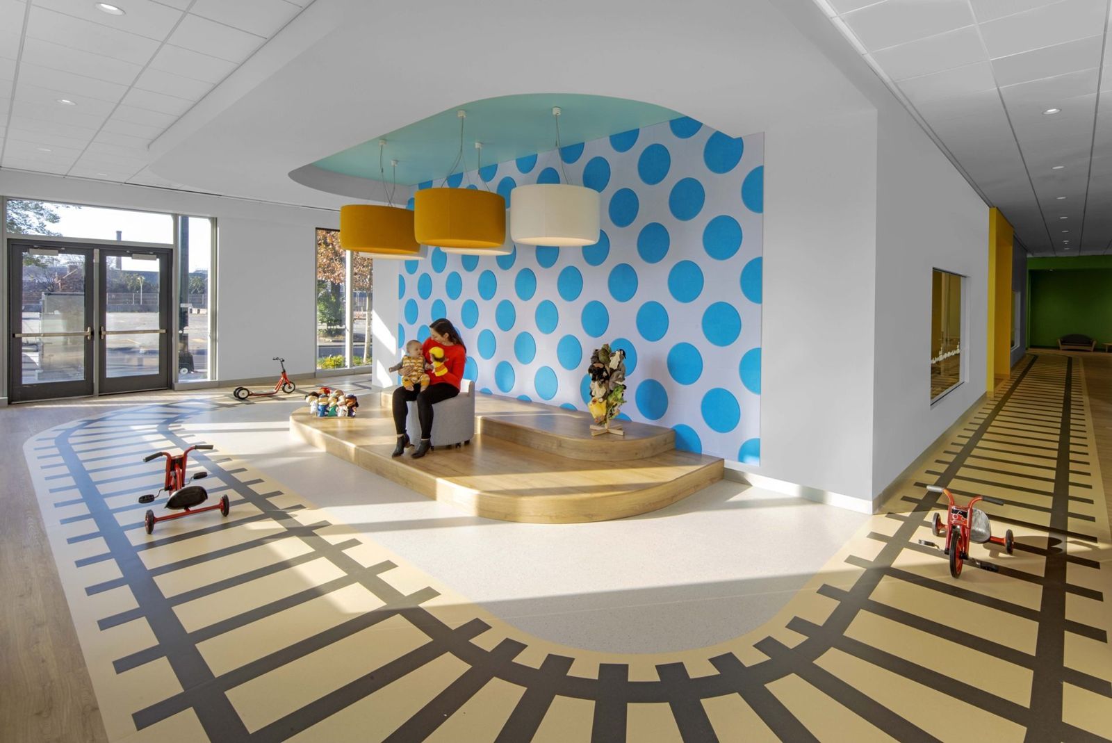 Norfolk Southern: Play area with a train track pattern on the floor