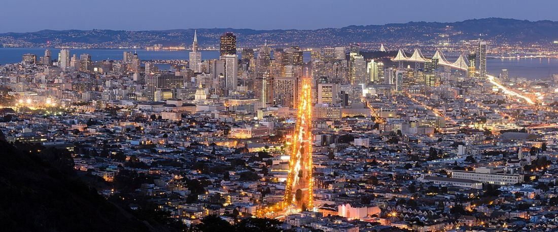 Night panorama of San Francisco with Market Street running toward the bay