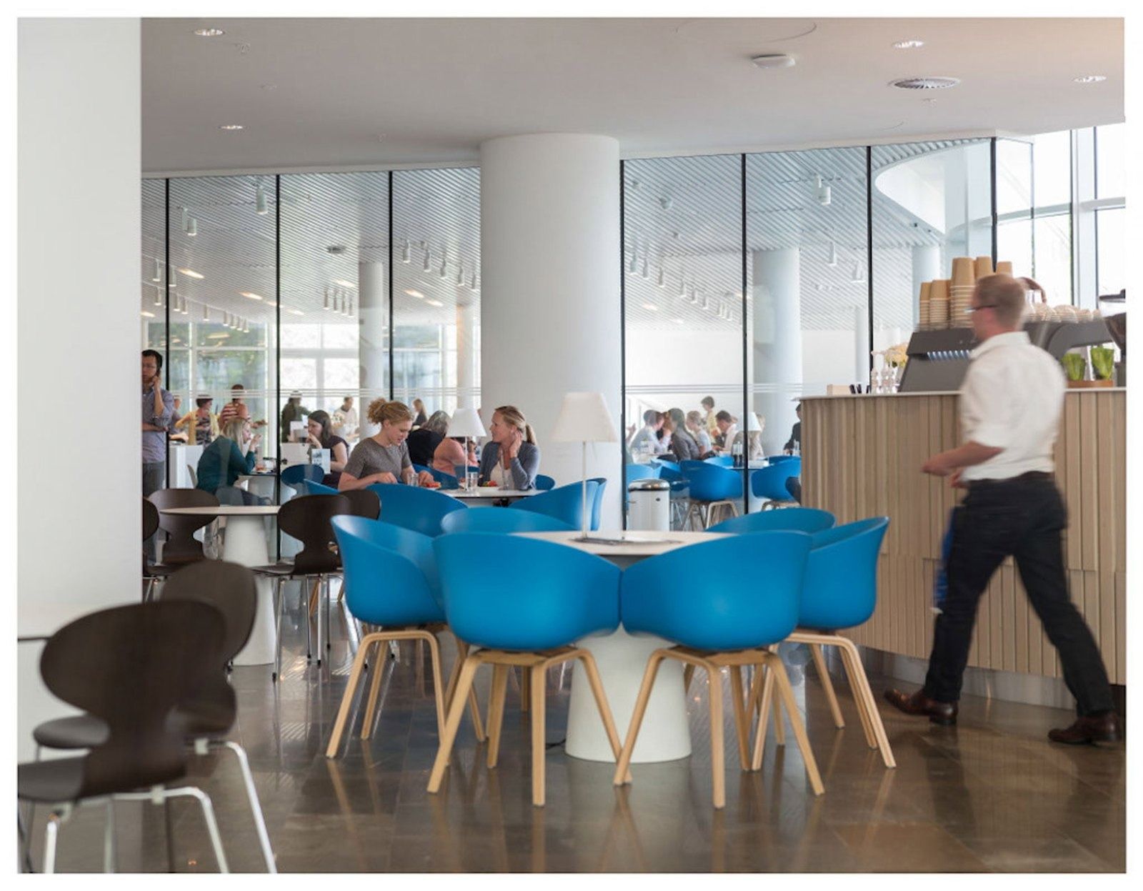 Novo Nordisk: A café with blue chairs by the windows