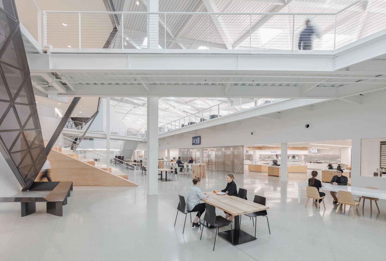 An open café floor under the triangular roof