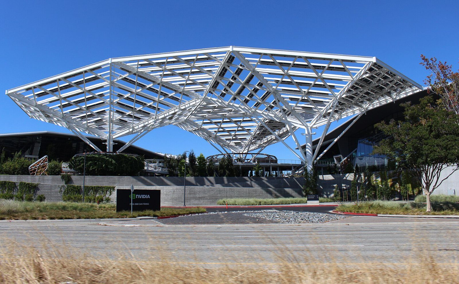 Large steel lattice canopy over an entrance