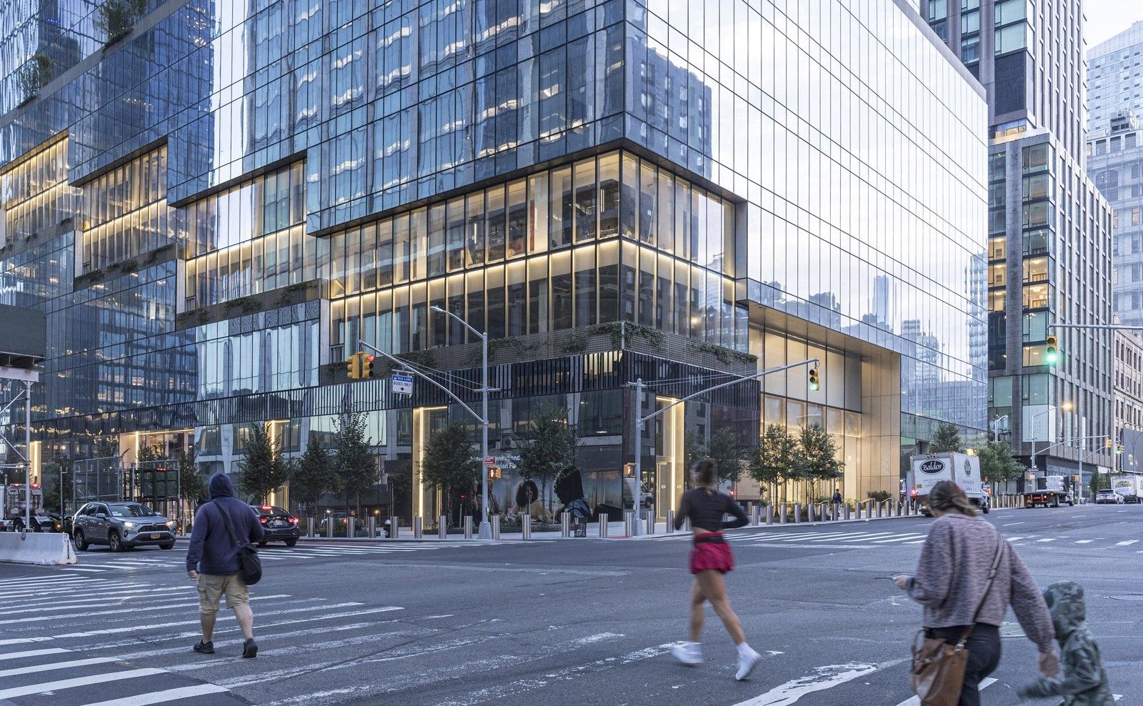 Pfizer: The tower's glass base at a street corner