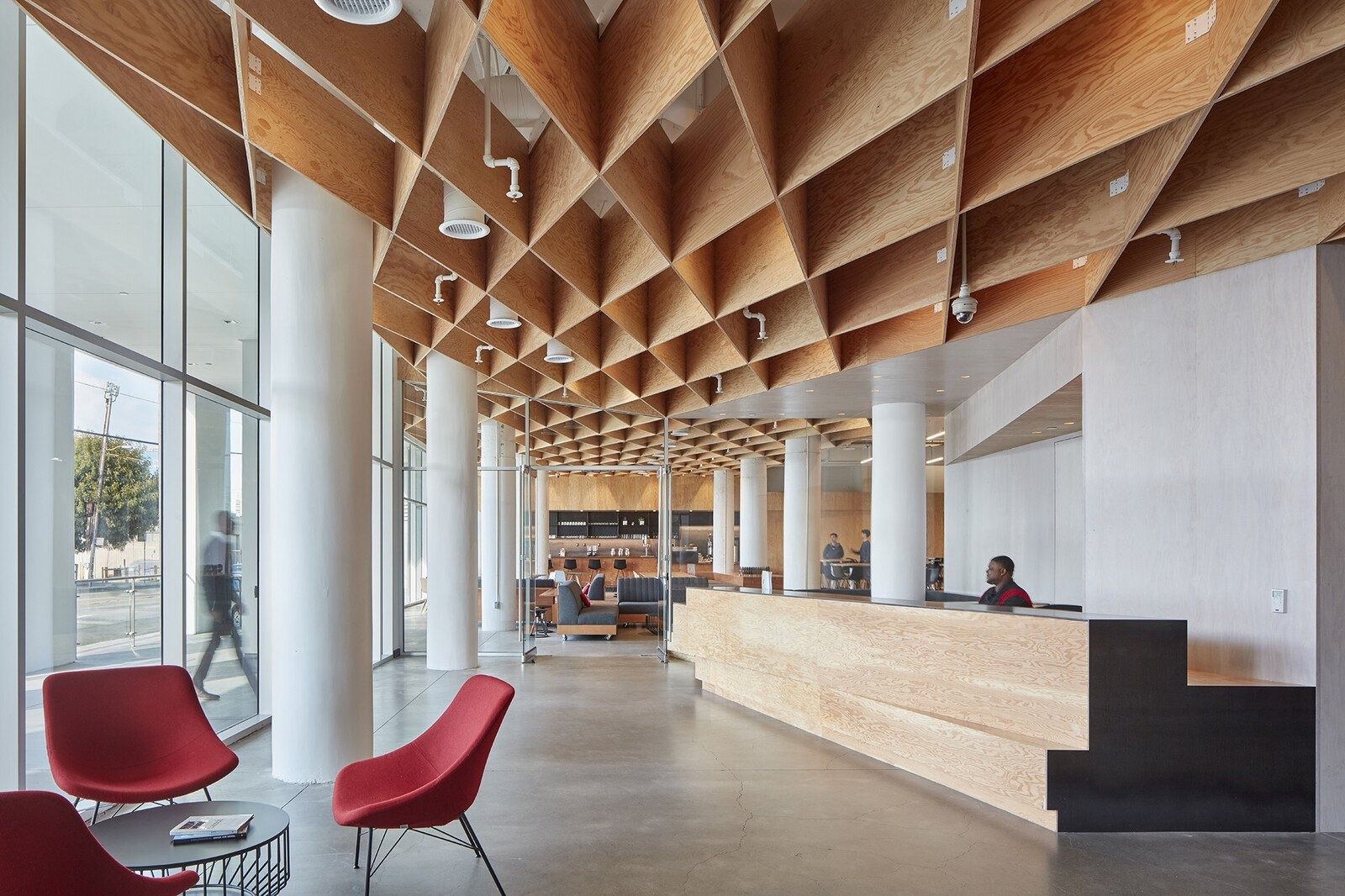 Pinterest: A reception counter beneath the timber ceiling