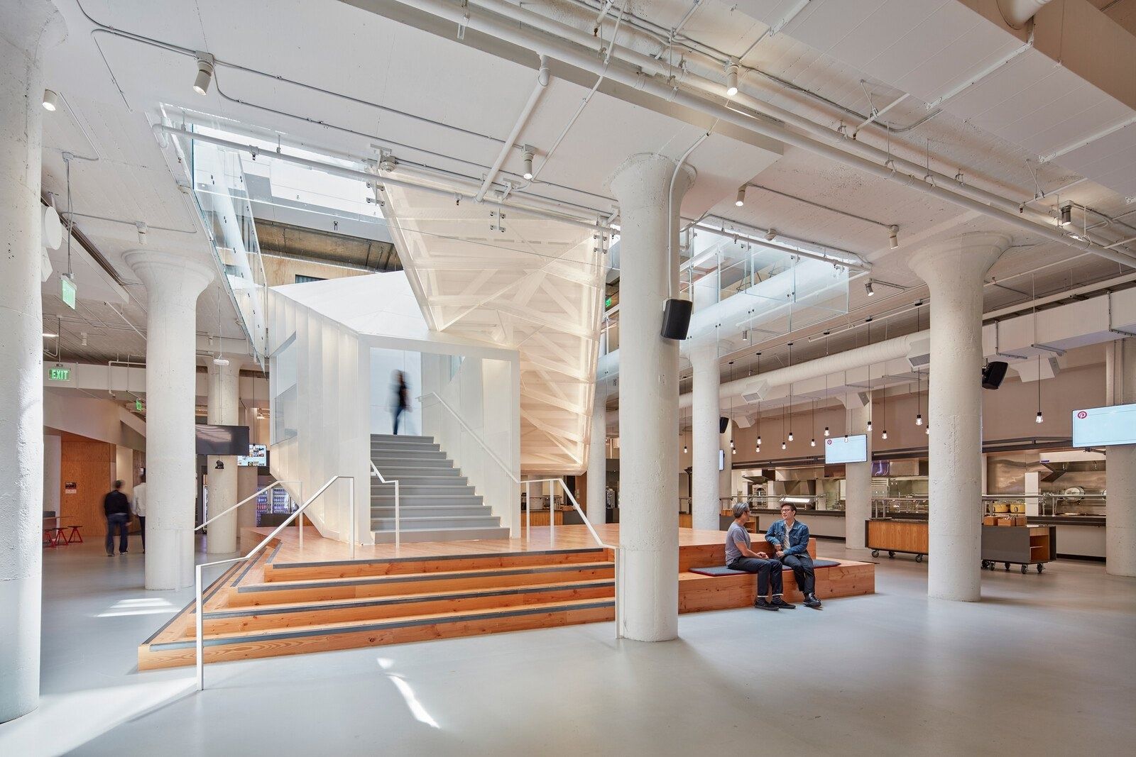 Pinterest: A white stair rising through an atrium cut through every floor