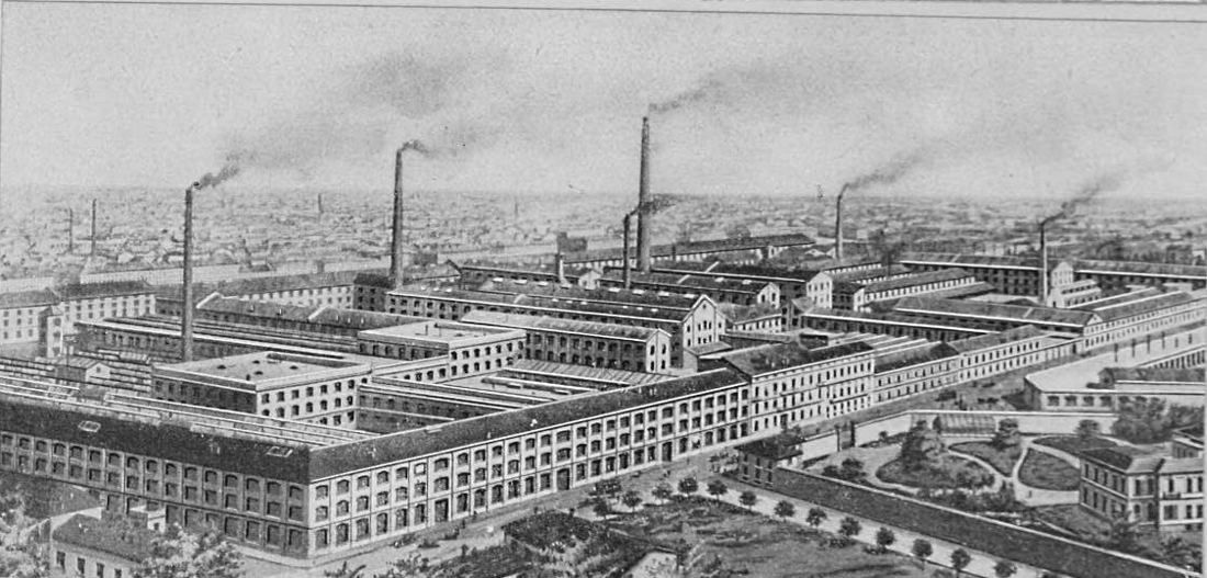 Engraving-style bird's-eye view of a large factory complex with smoking chimneys