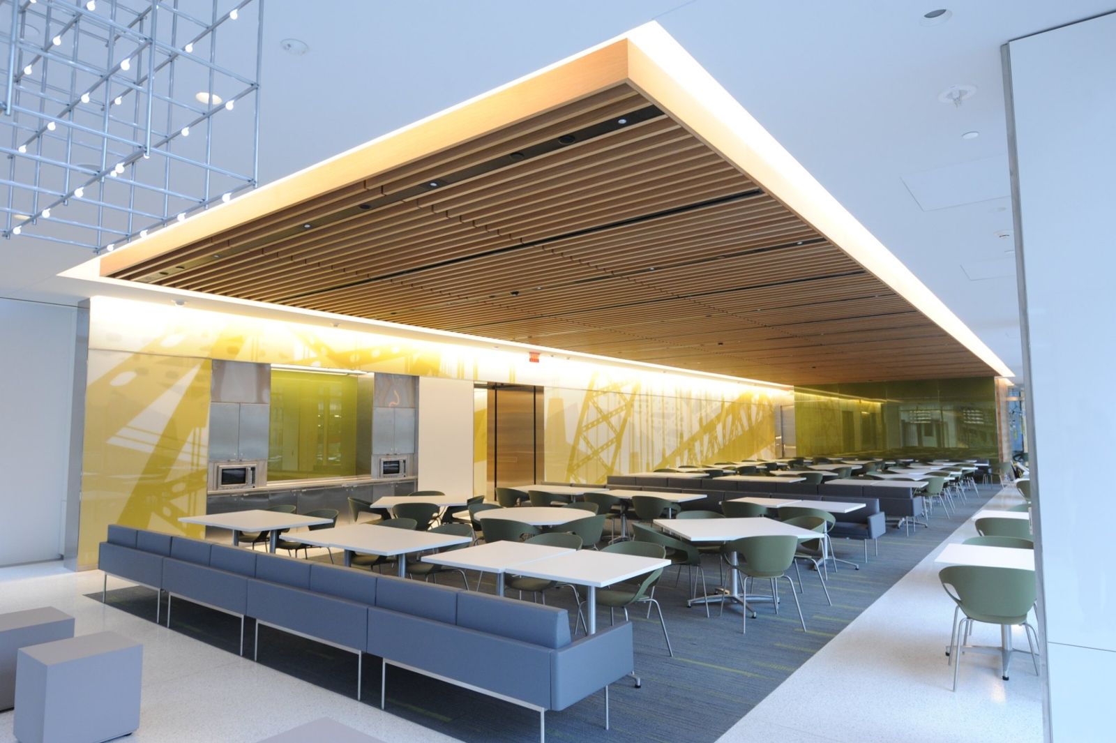 PNC Financial Services: Dining room with booths under a wooden ceiling panel