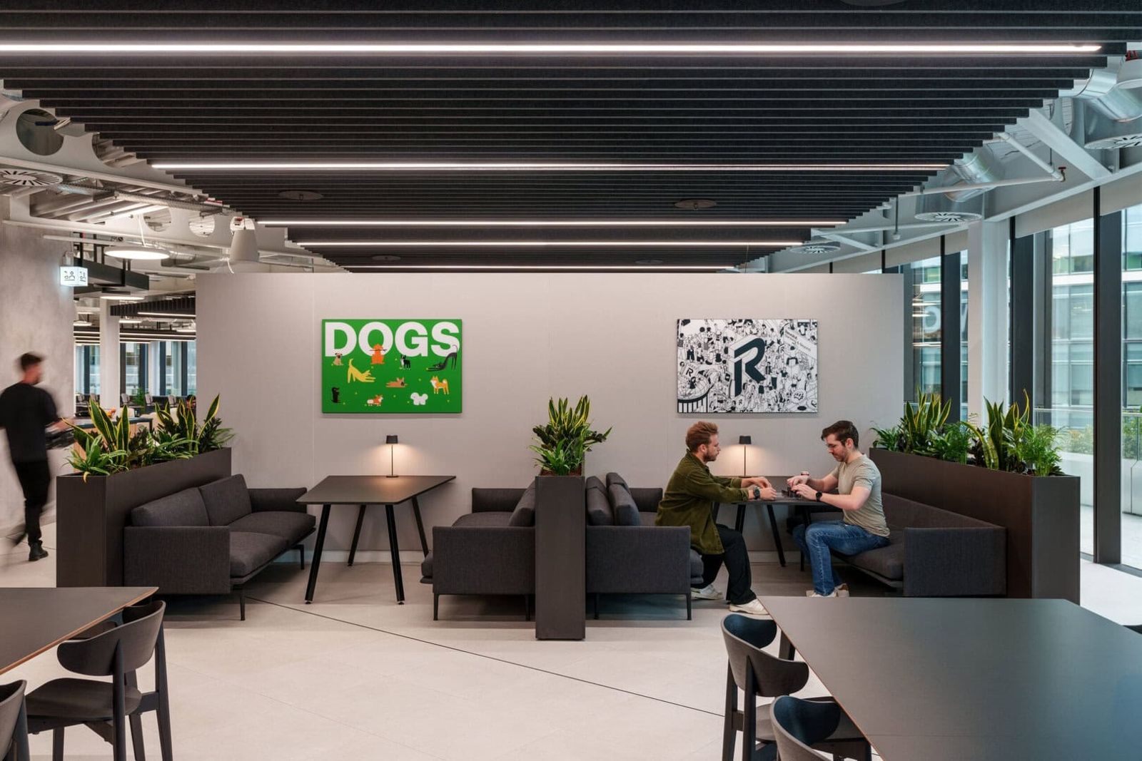 Revolut: Lounge with sofas, planters and artwork