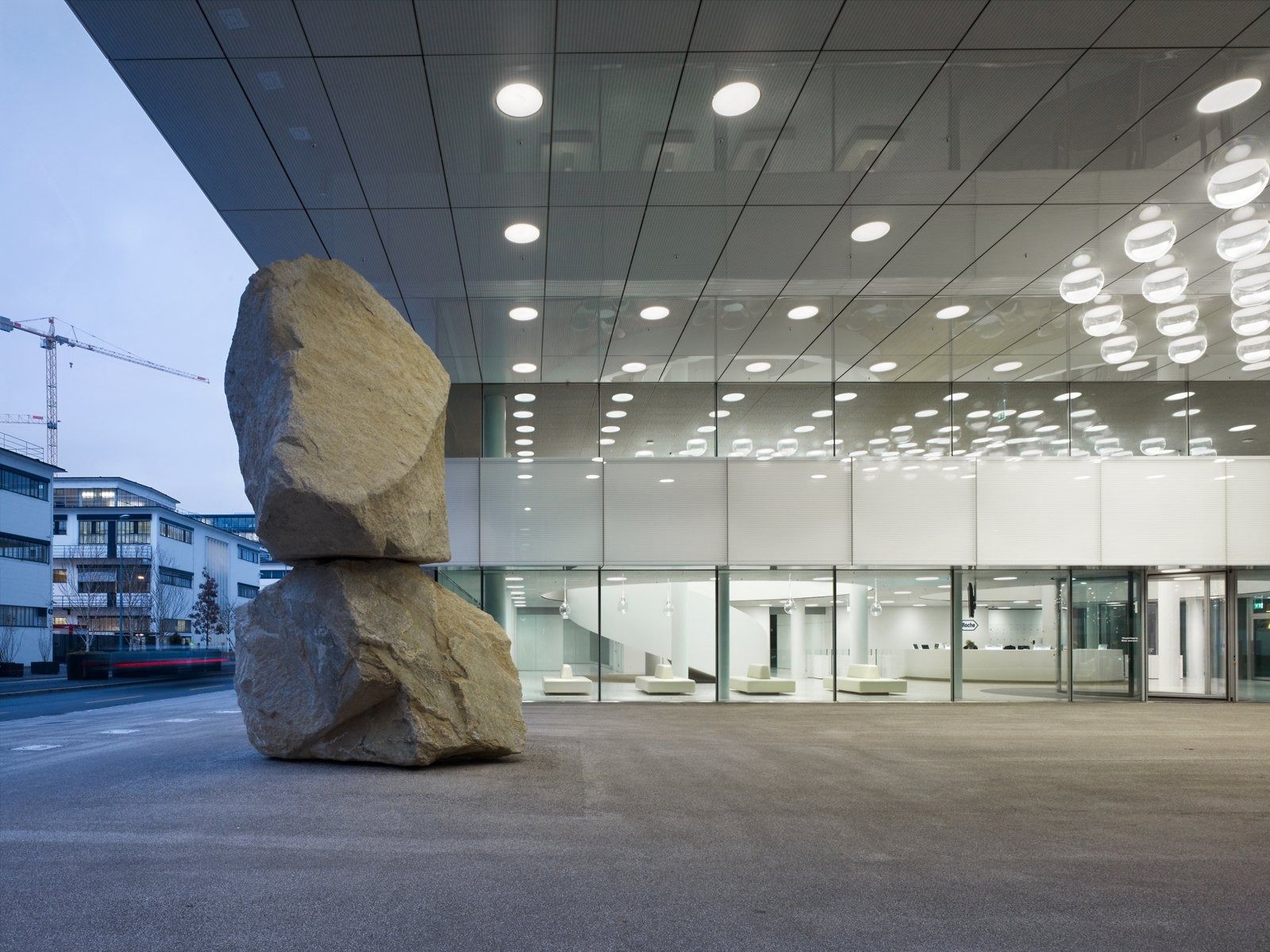 Roche: Large boulder sculpture in a covered entrance hall