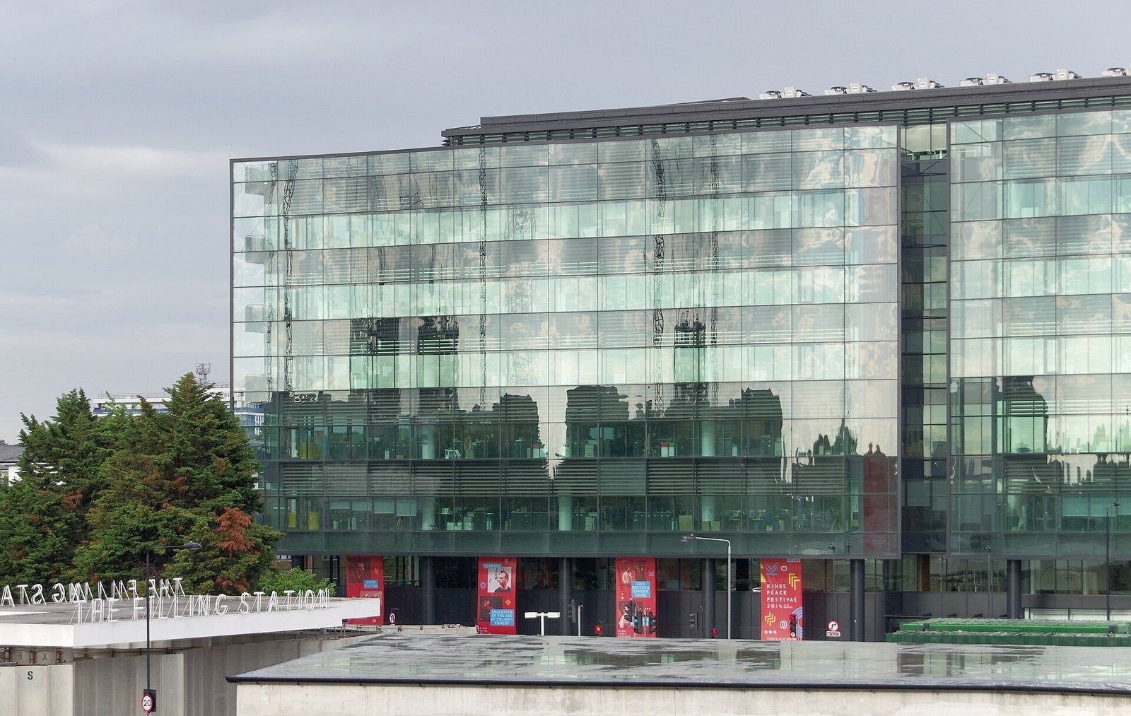 Rolls-Royce: Glass office building seen from a raised viewpoint, with red panels at ground level