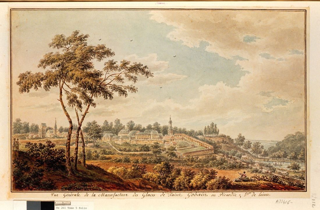 18th-century drawing of a large manufactory complex on a hillside seen beyond trees