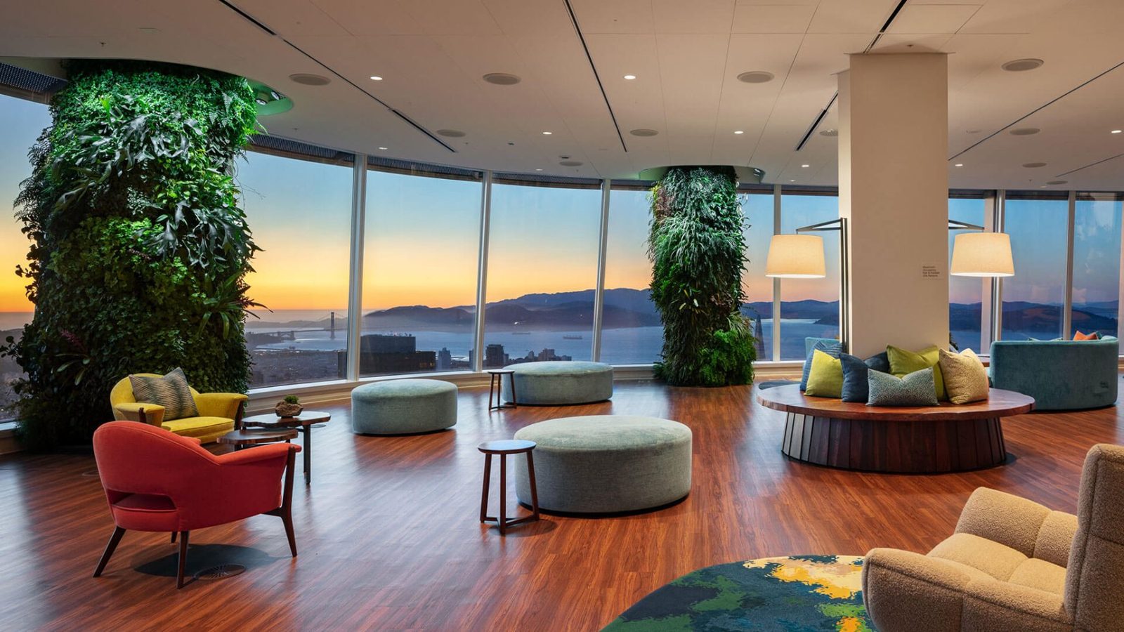 Salesforce: Colourful armchairs among plant columns