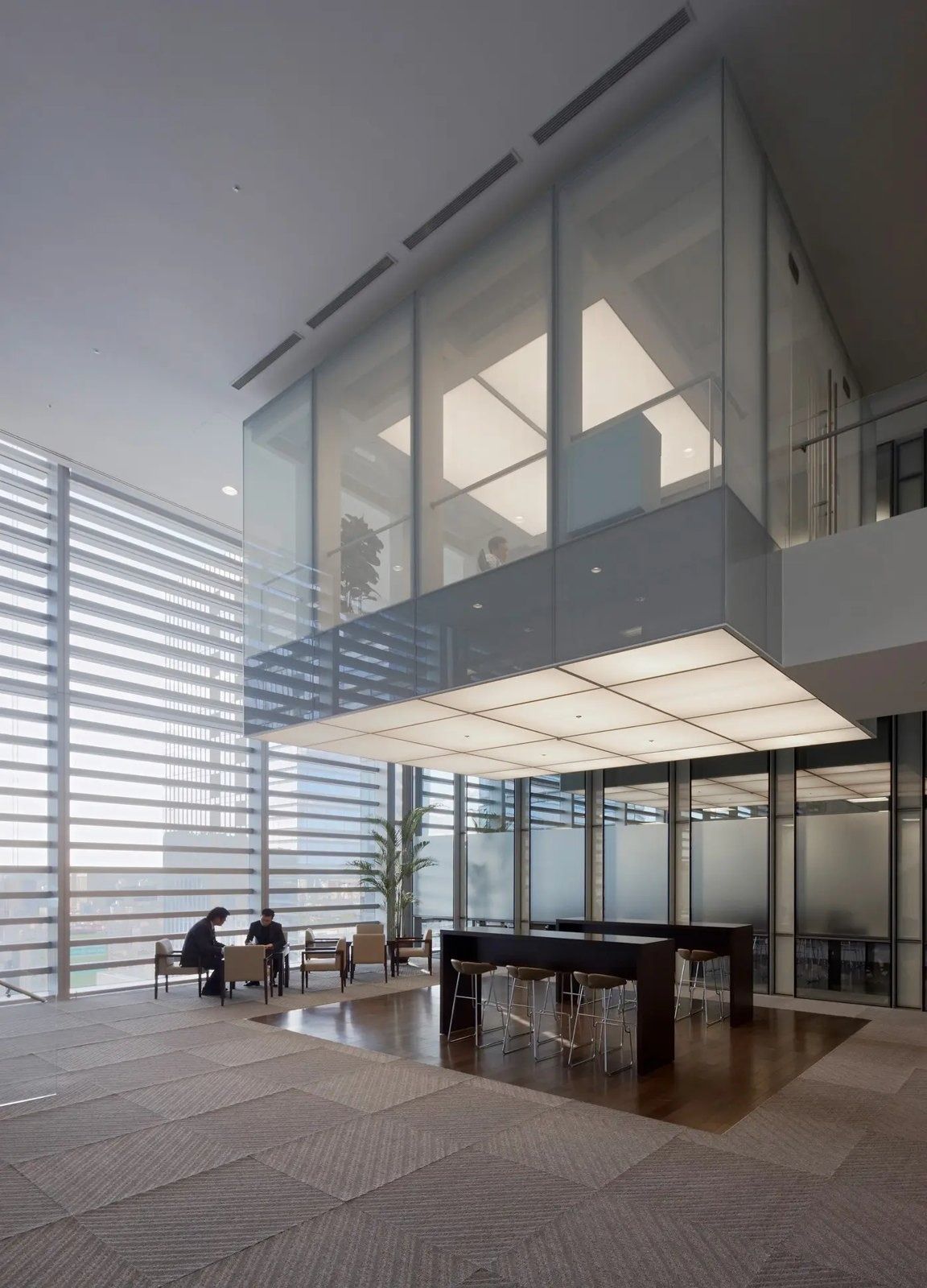 Samsung Electronics: A glass meeting box above a lobby