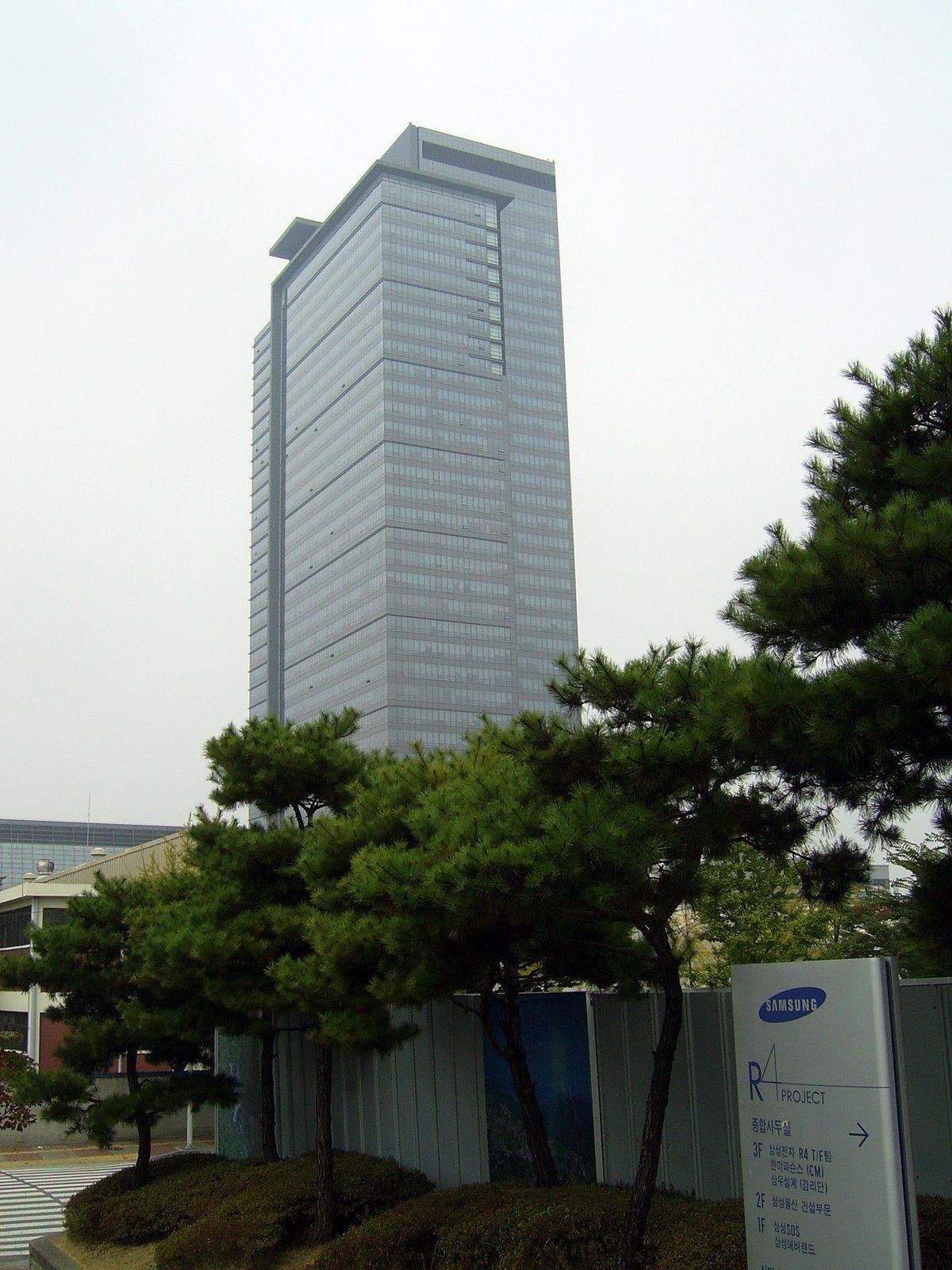 Samsung Electronics: A Samsung tower among pine trees