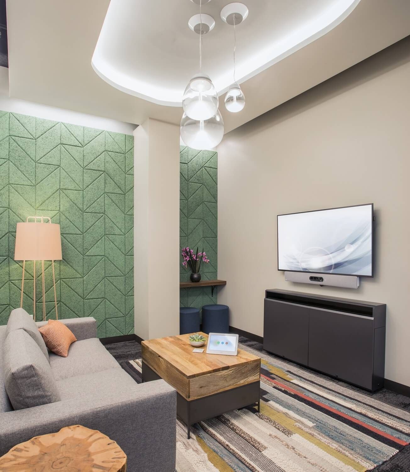 ServiceNow: A quiet room with a sofa and screen