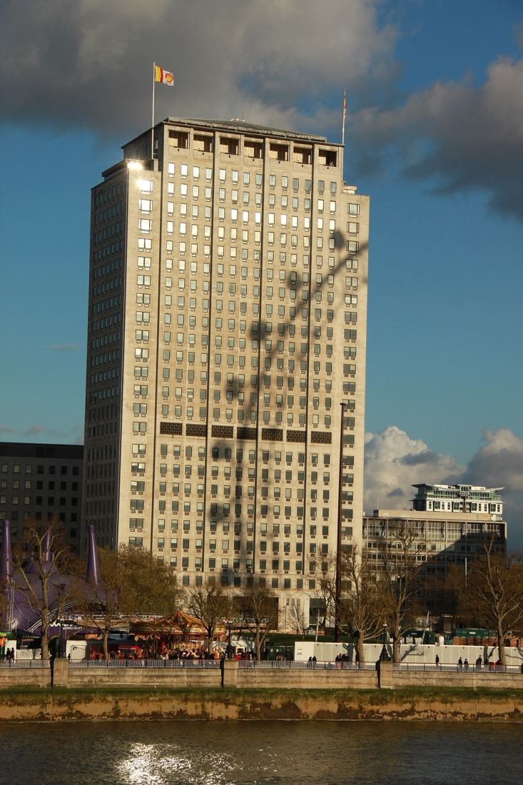 Shell: Tower in late afternoon light above the riverside promenade