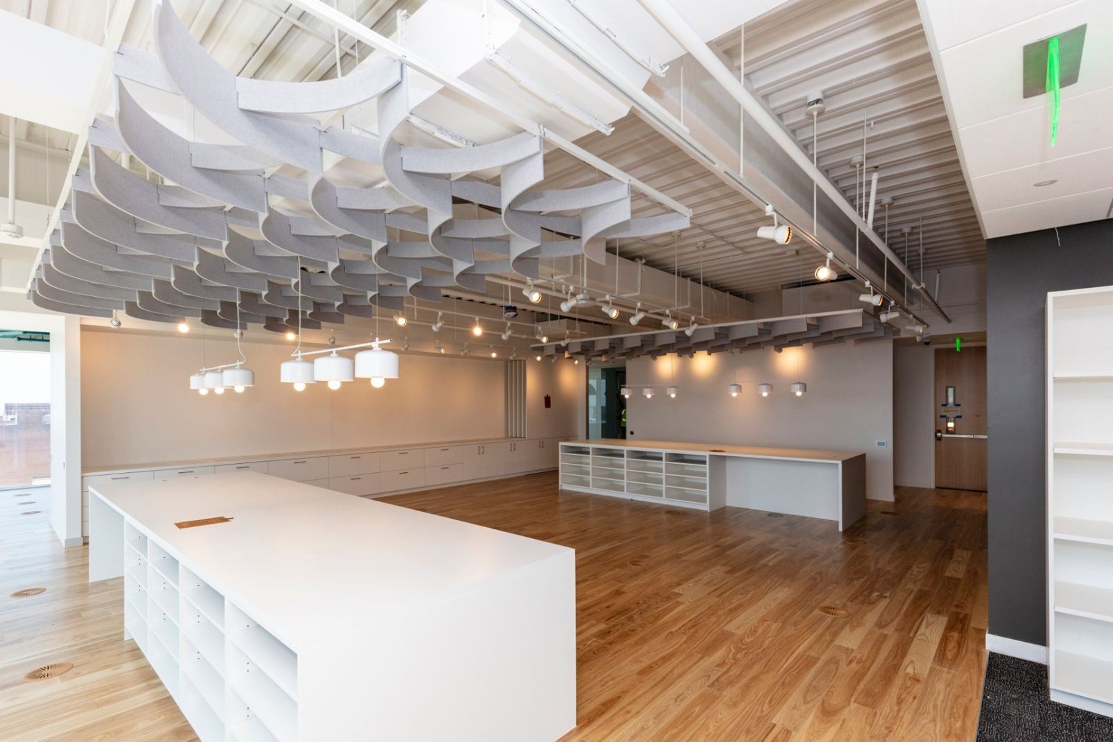 Sherwin-Williams: Open room with a long white counter and a sculpted white ceiling