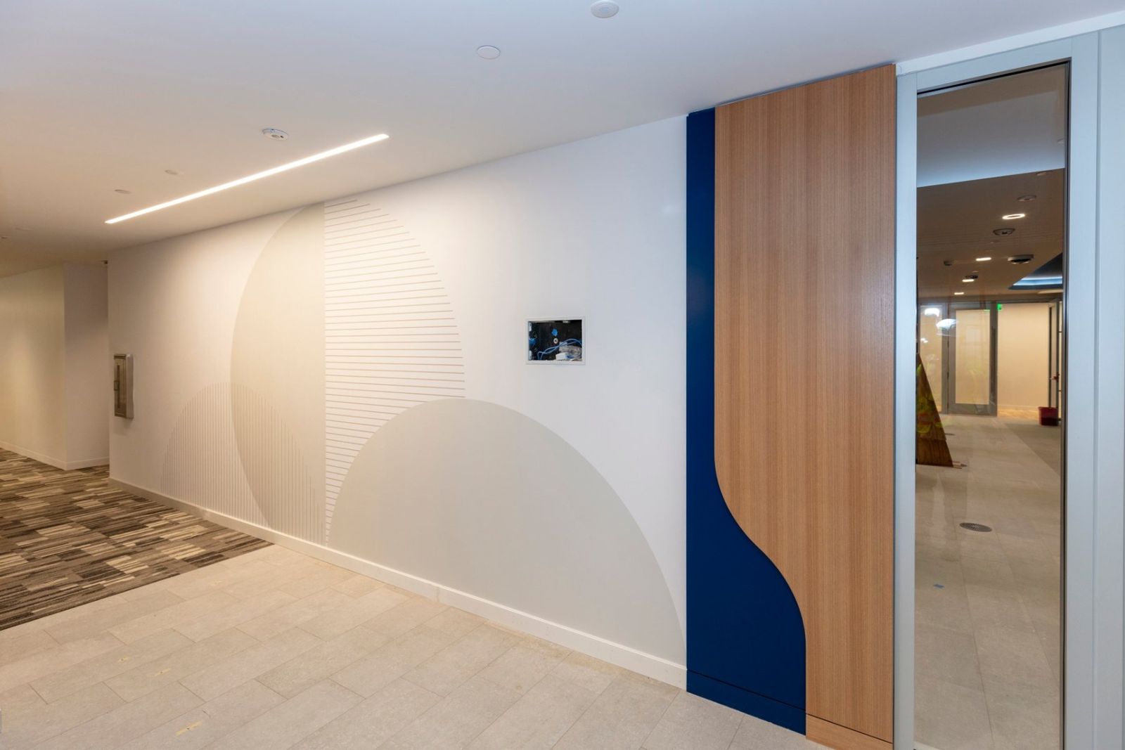 Sherwin-Williams: White wall with a curved blue and wood panel