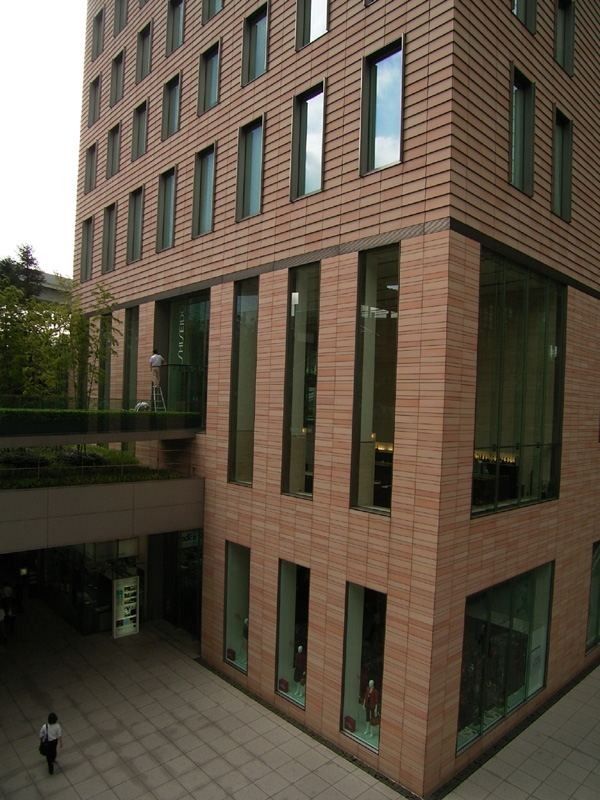 Brick-clad office building of the Shiseido Shiodome office seen from above