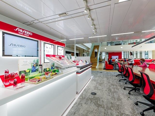 Shiseido: Long tables with red chairs
