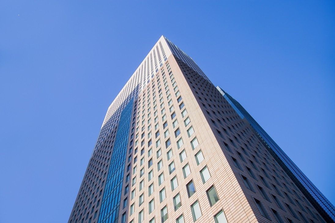 Shiseido: Tall tower against a blue sky