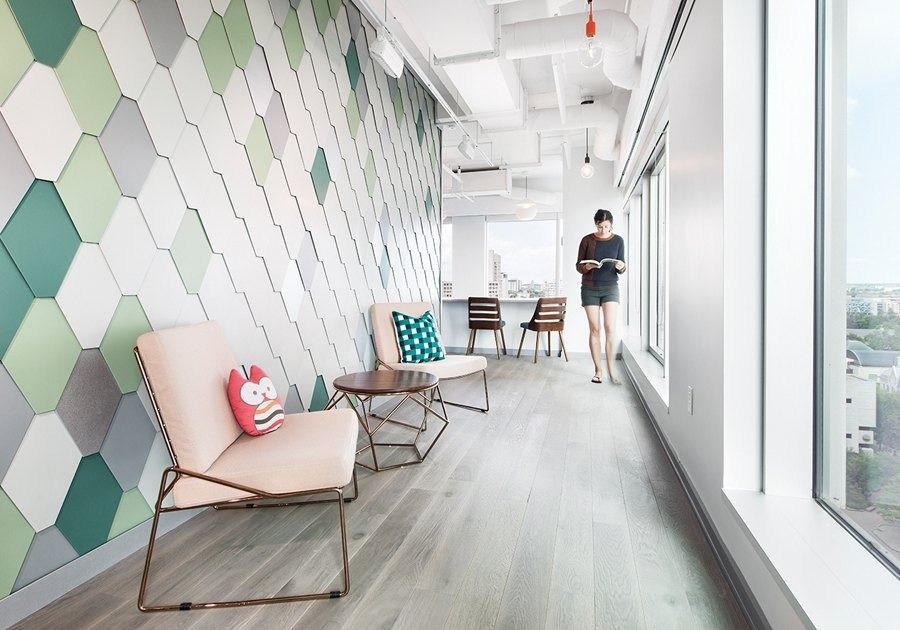 Shopify: A hallway with a hexagon tile wall
