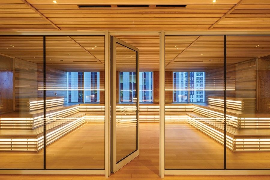 Shopify: A wood-lined meeting room with tiered seating like a sauna