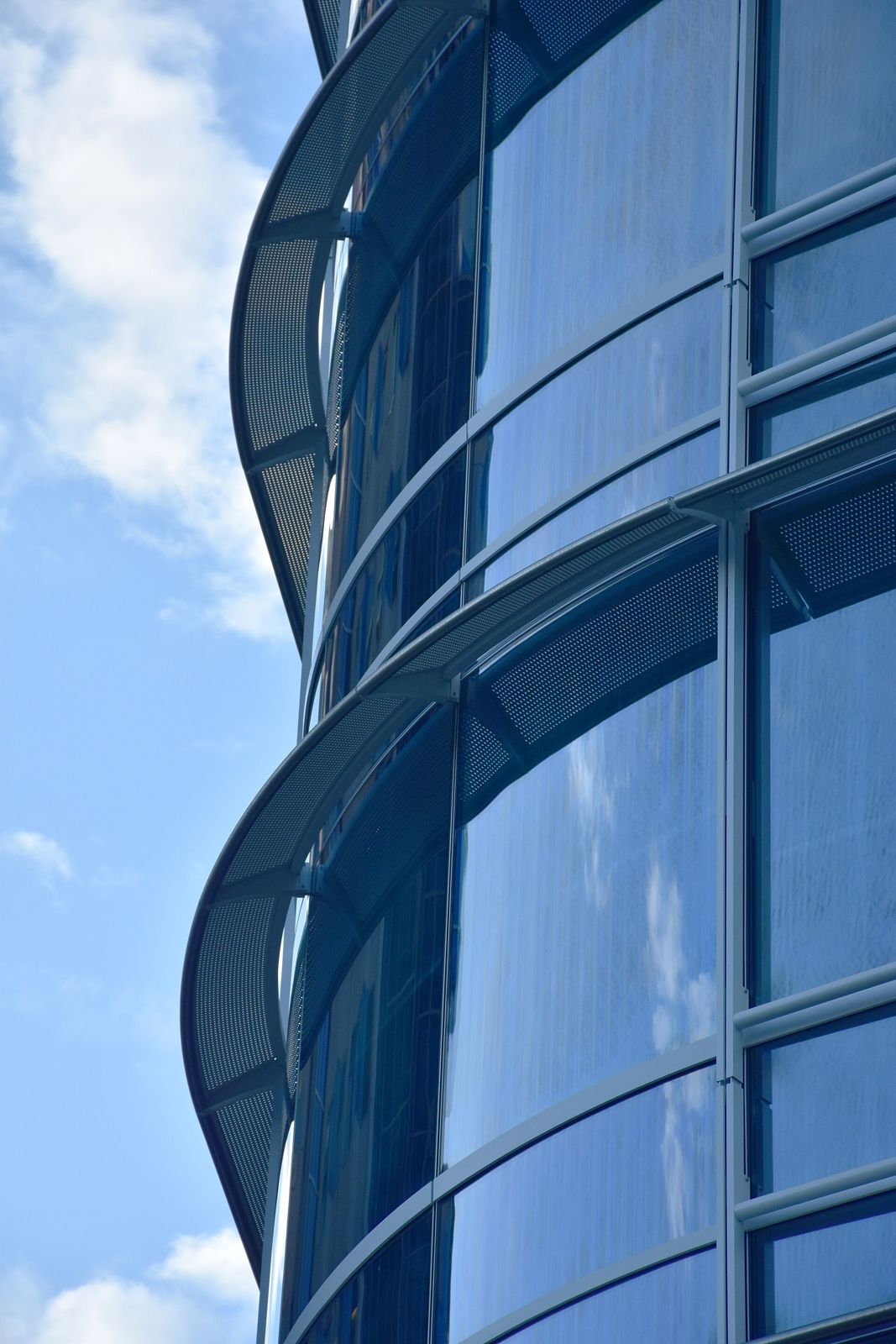 Slack: Close-up of curved glass and horizontal fins