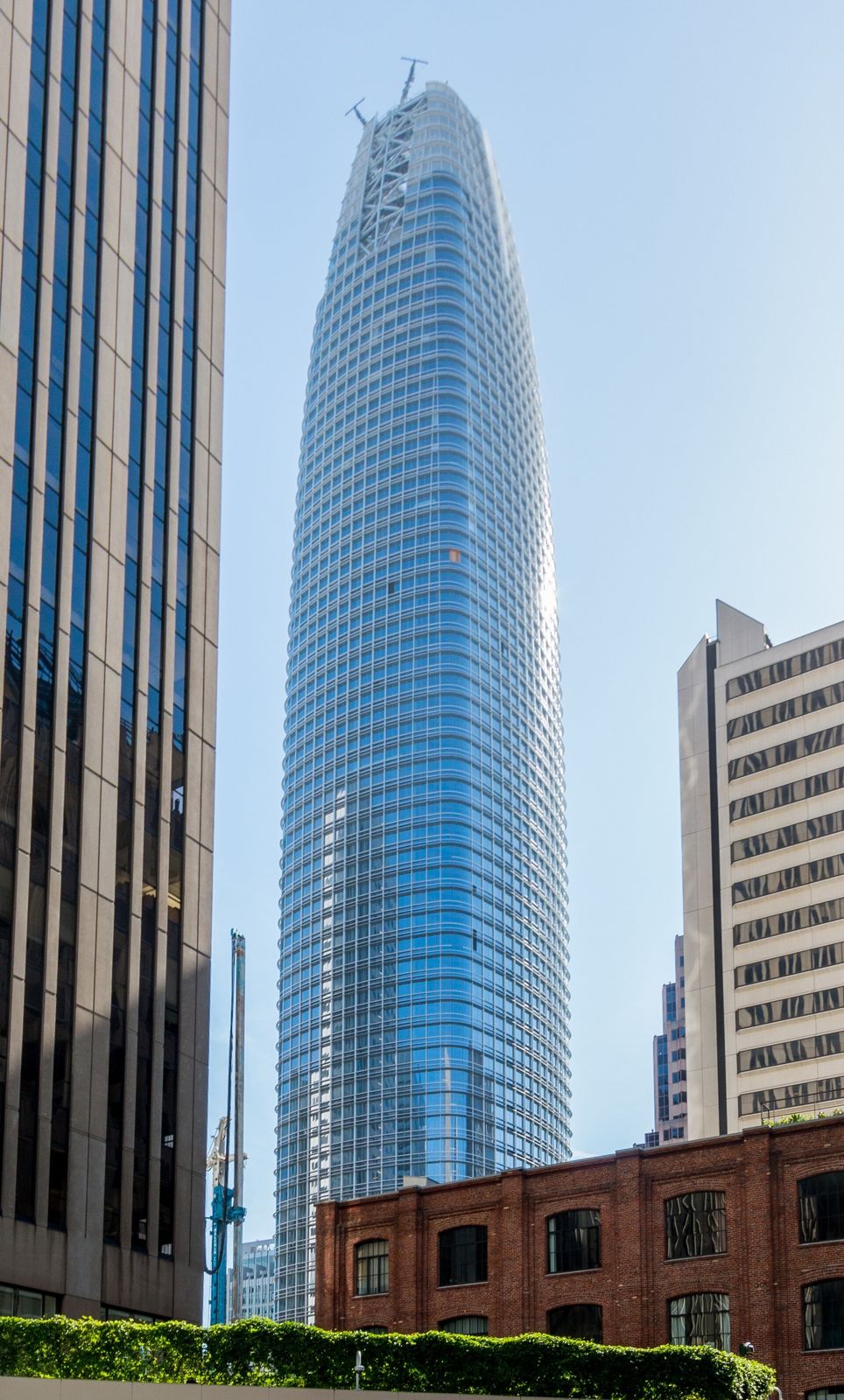 Slack: The tapered glass tower against a blue sky