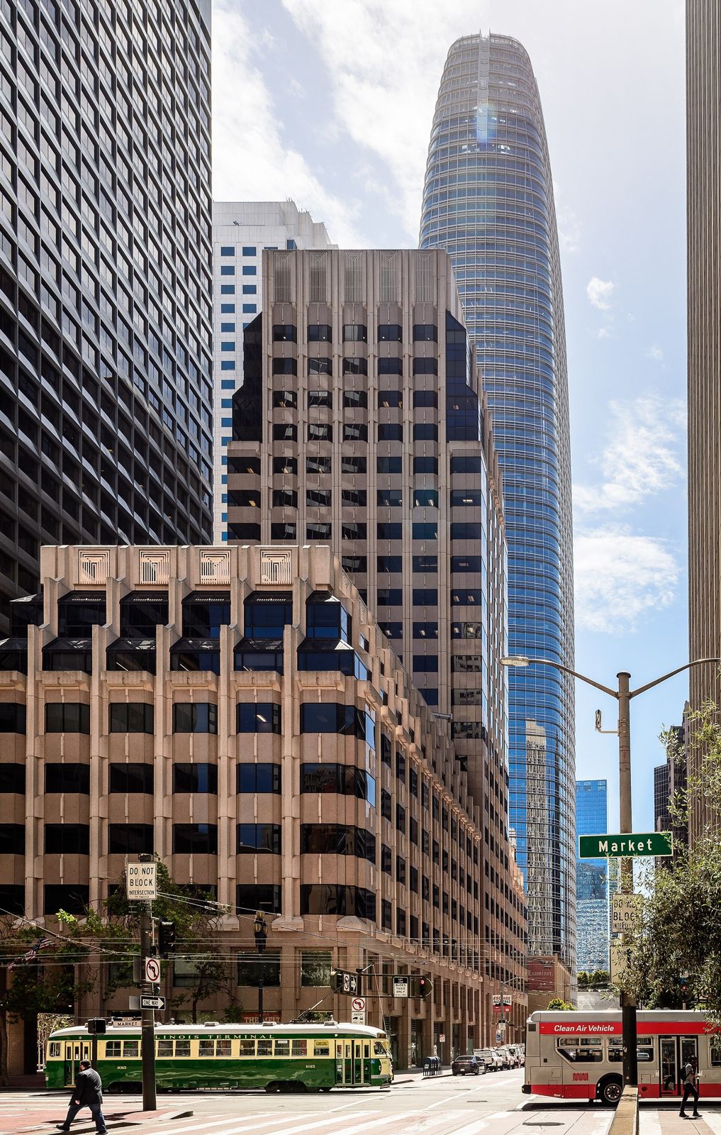 Slack: The tower at the end of a street with a vintage streetcar