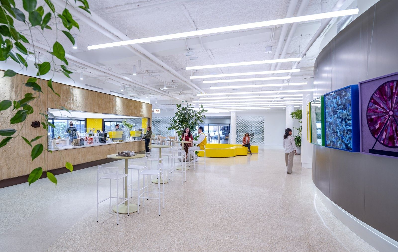 Snap: A long hall with a lounge and art screens