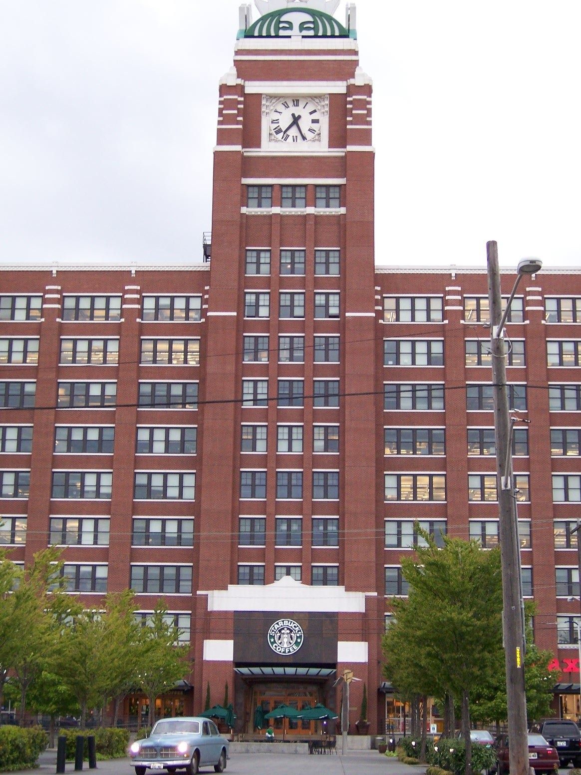 Tall red brick building with a clock tower
