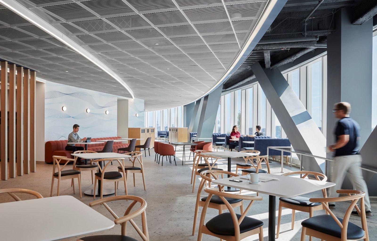 State Street: Café seating below sloping steel columns