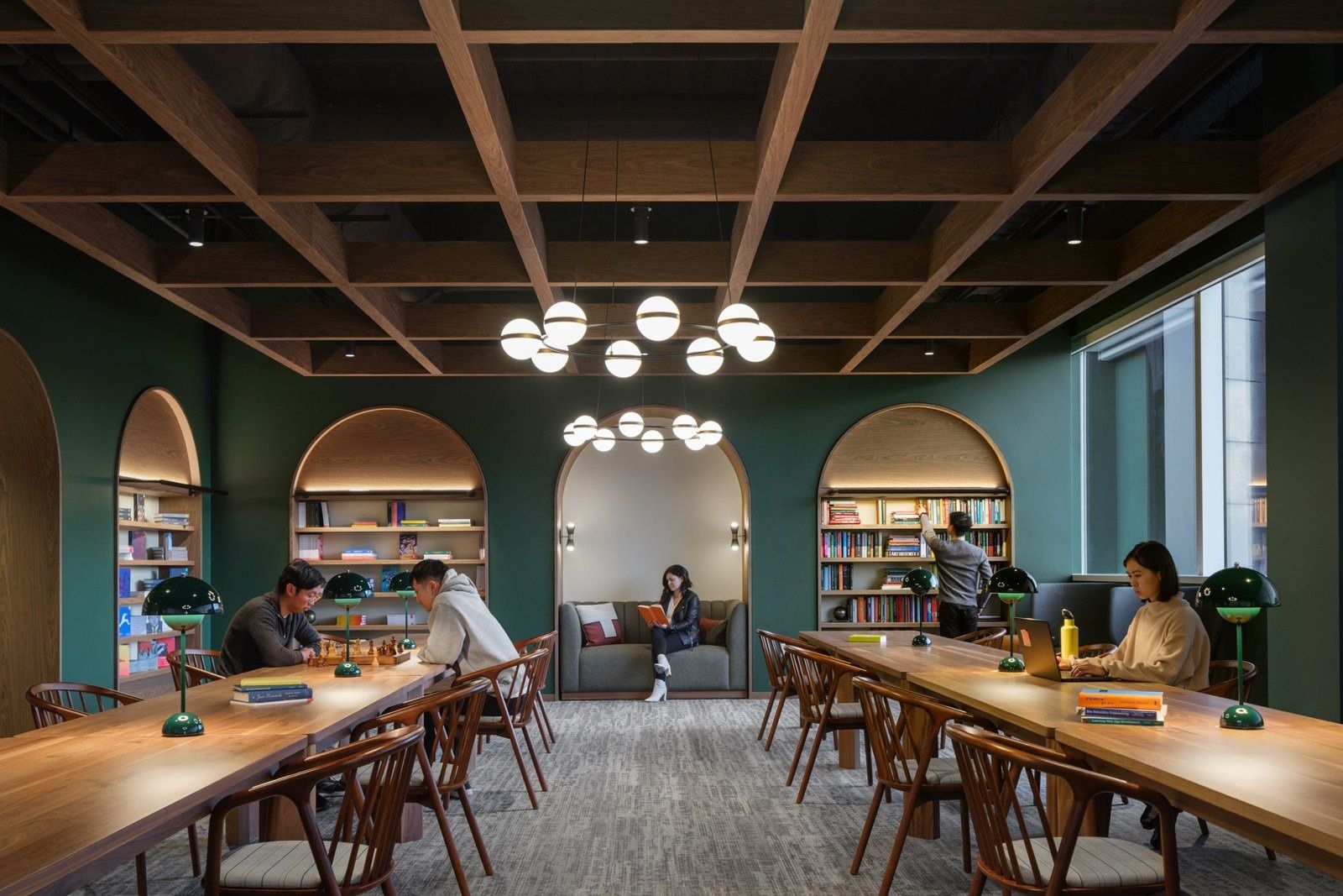 Stripe: A library with arched shelves and long reading tables