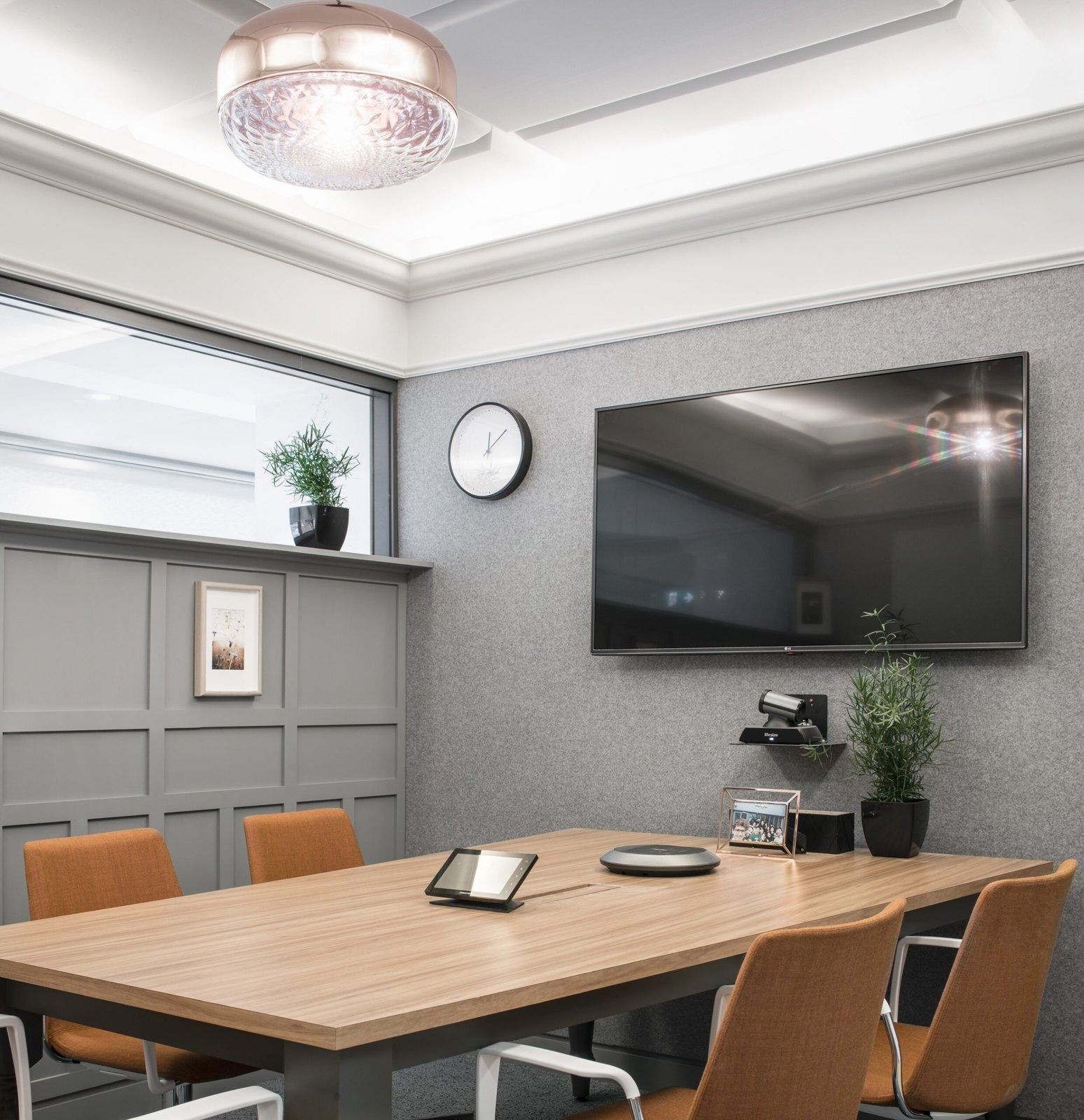Stripe: A meeting table under a ceiling light