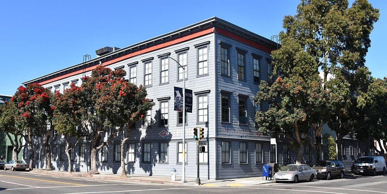 Three-storey wooden Pioneer Building on a street corner