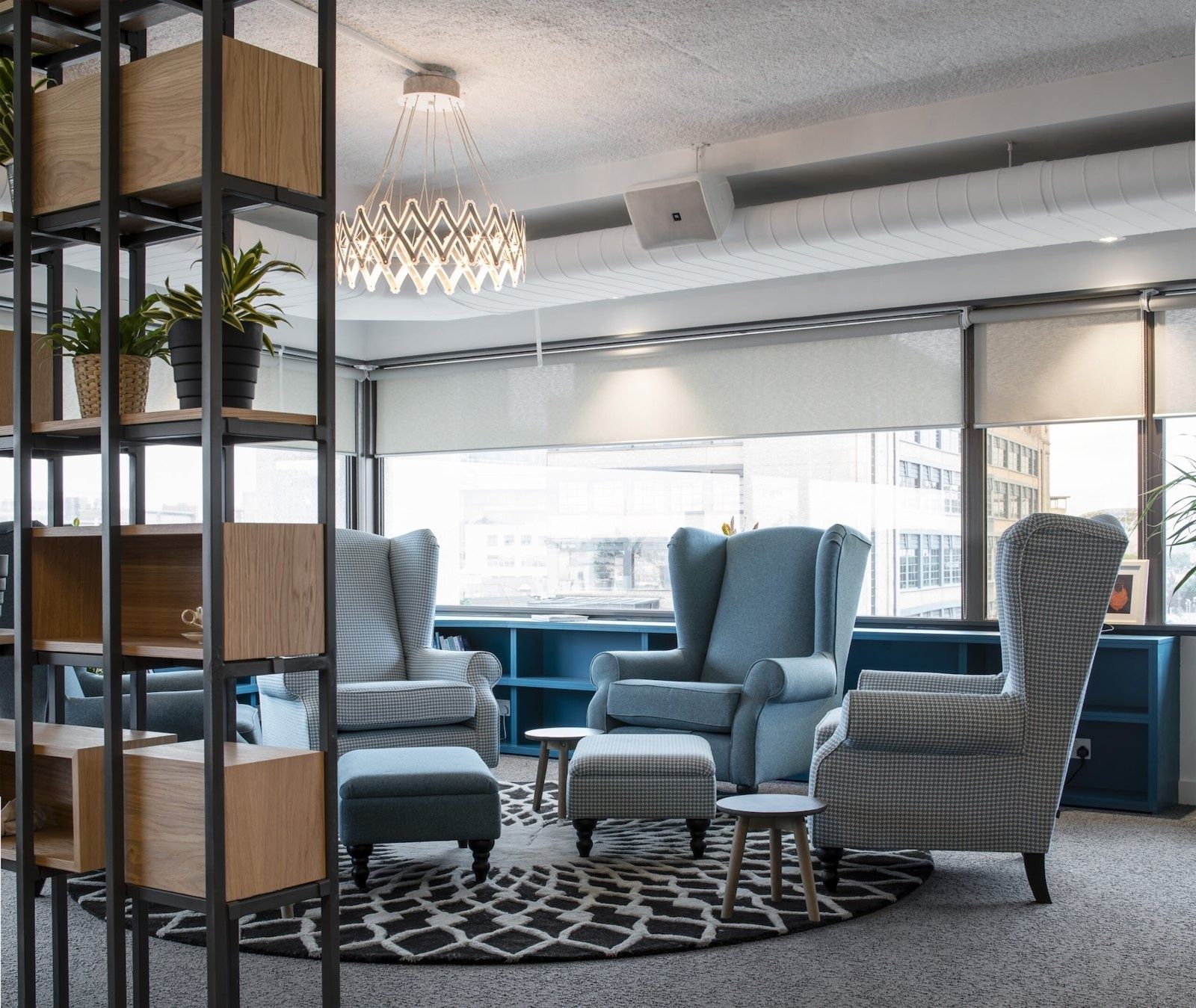 Stripe: Wingback chairs by windows
