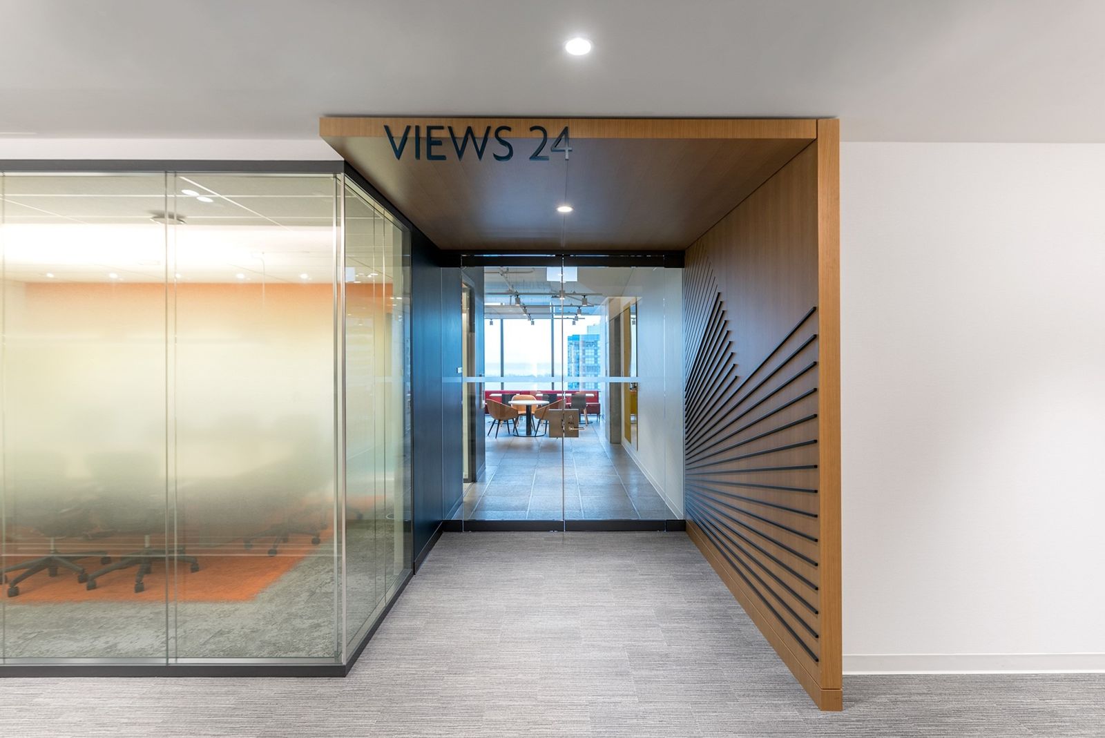 Sun Life: Frosted glass meeting rooms framed in wood