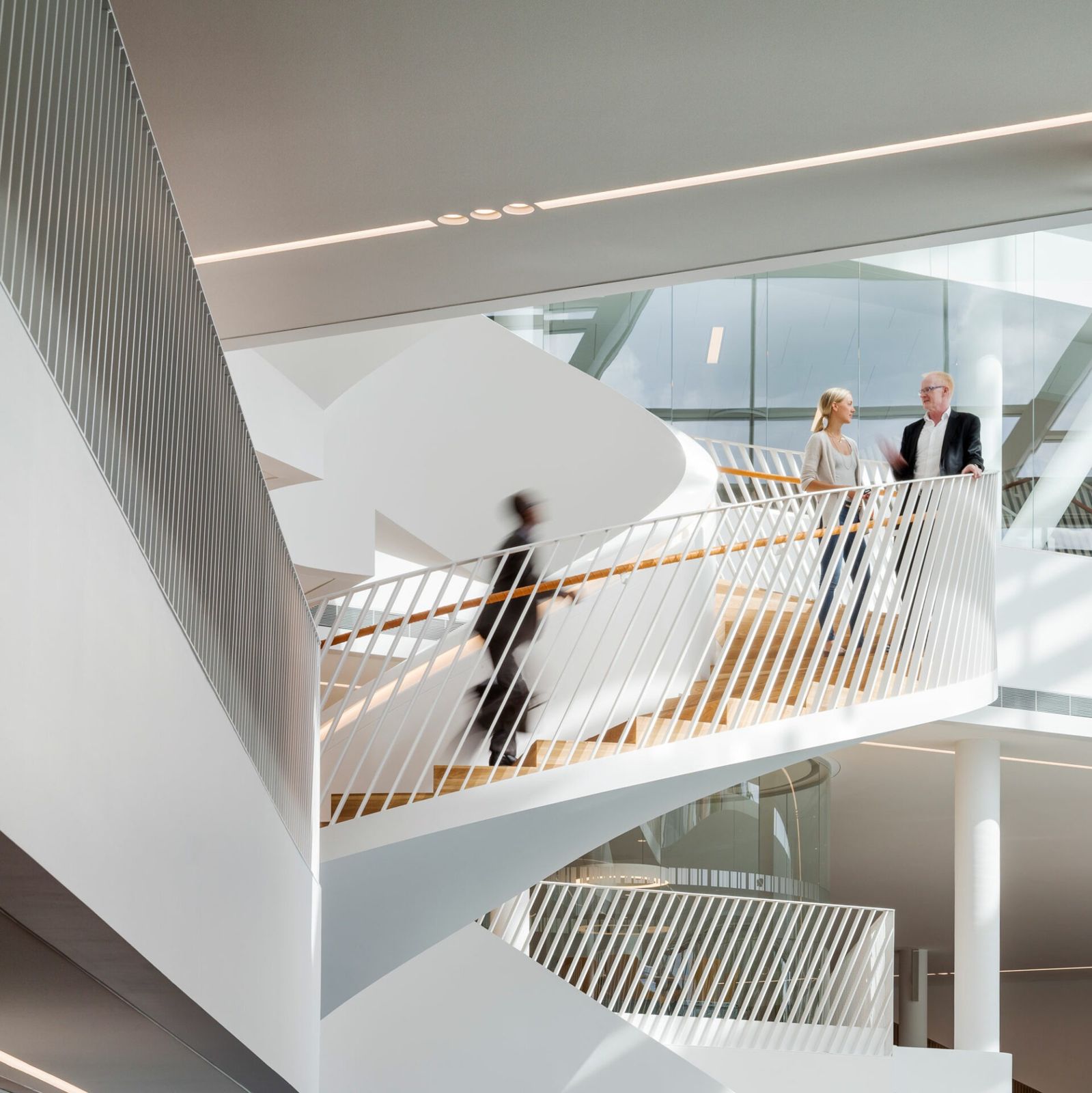 Swedbank: Two people on a curving white stair