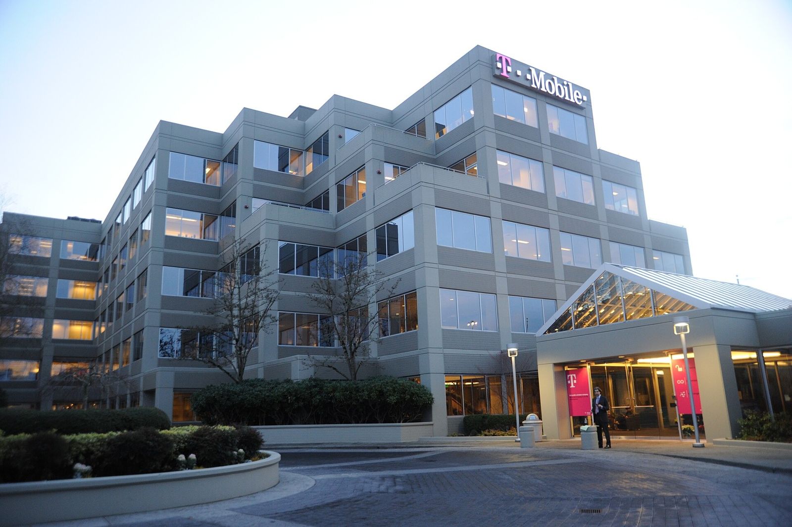 Glass office building with a T-Mobile sign
