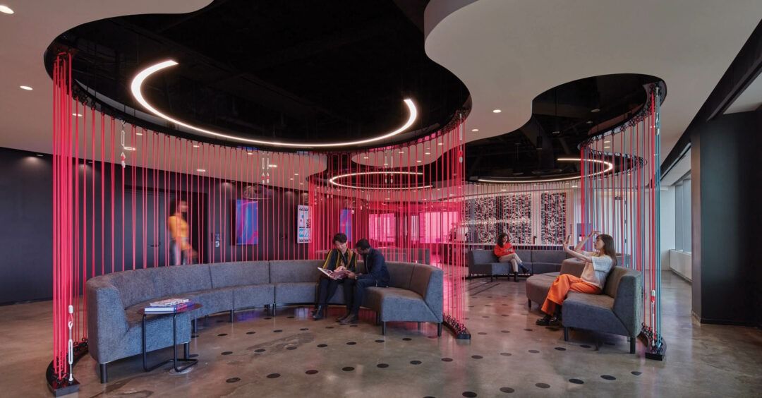 T-Mobile US: Lounge with curved sofas and hanging magenta cords