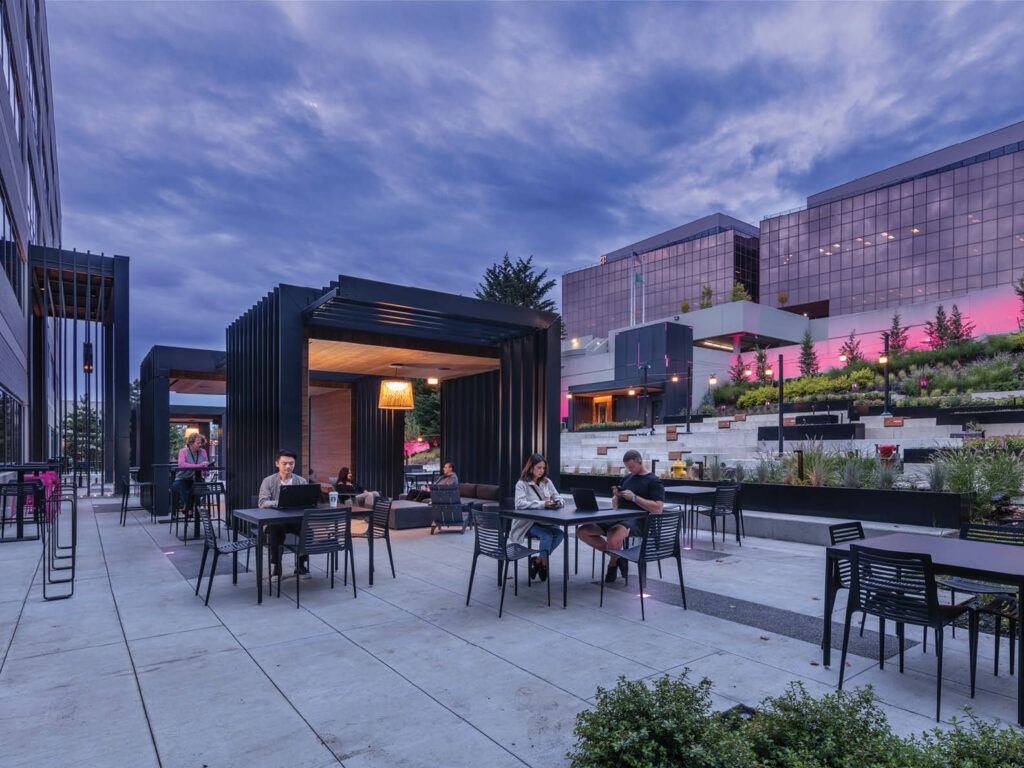T-Mobile US: Outdoor tables beside planted terraces