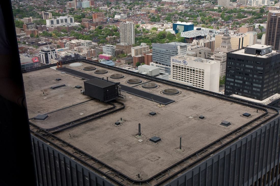 TD Bank Group (The Toronto-Dominion Bank): Flat roof of the low pavilion seen from high above, with the city beyond