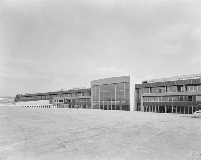Black-and-white view of the Fornebu airport terminal from the airside
