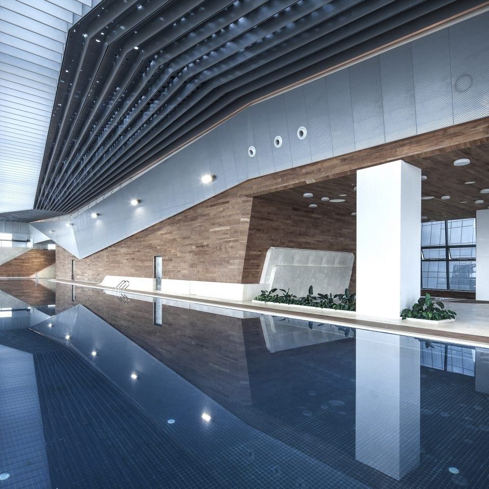 Tencent: Indoor swimming pool with a long window and wood-clad ceiling