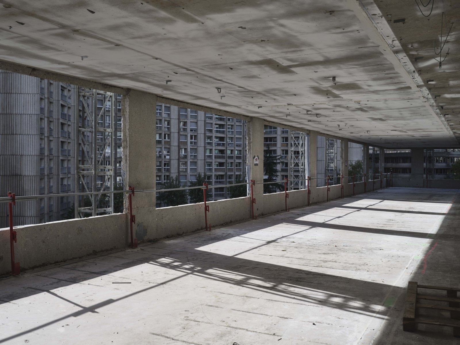 TotalEnergies: Unfinished floor with daylight streaming in