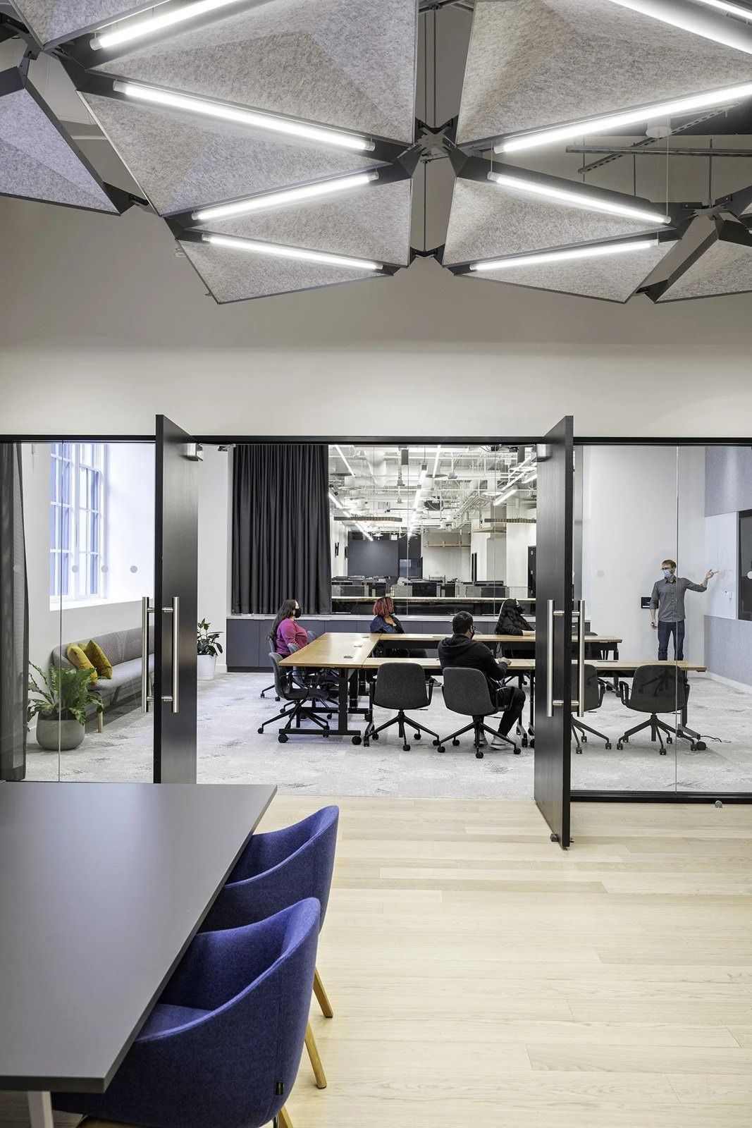 Twilio: Glass meeting room seen through open doors