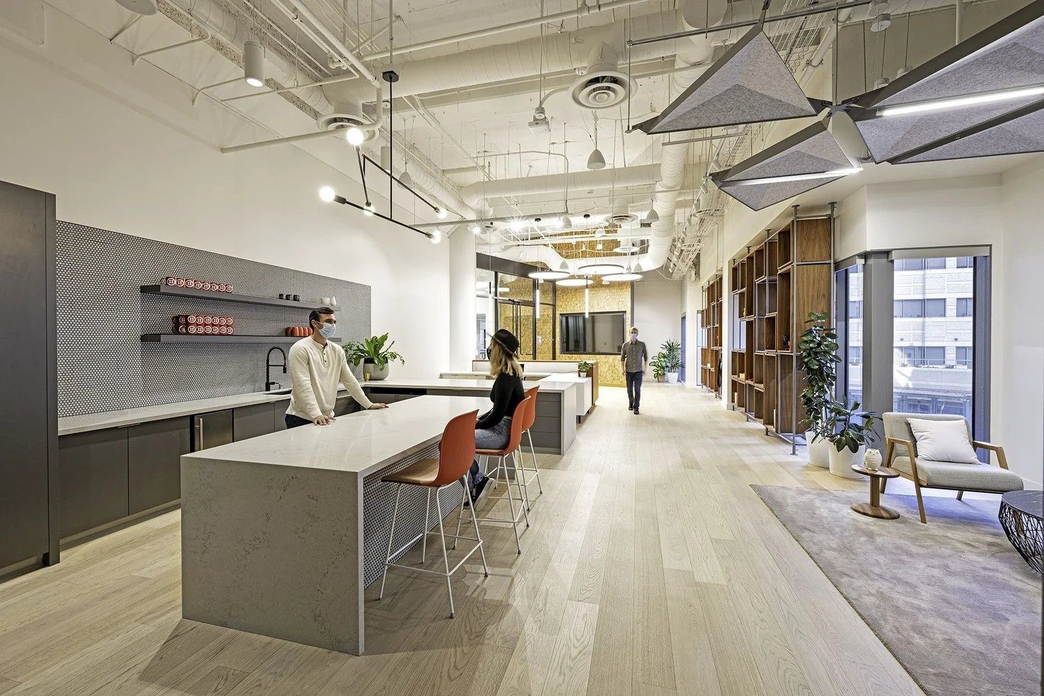 Twilio: Kitchen island with stools and shelves