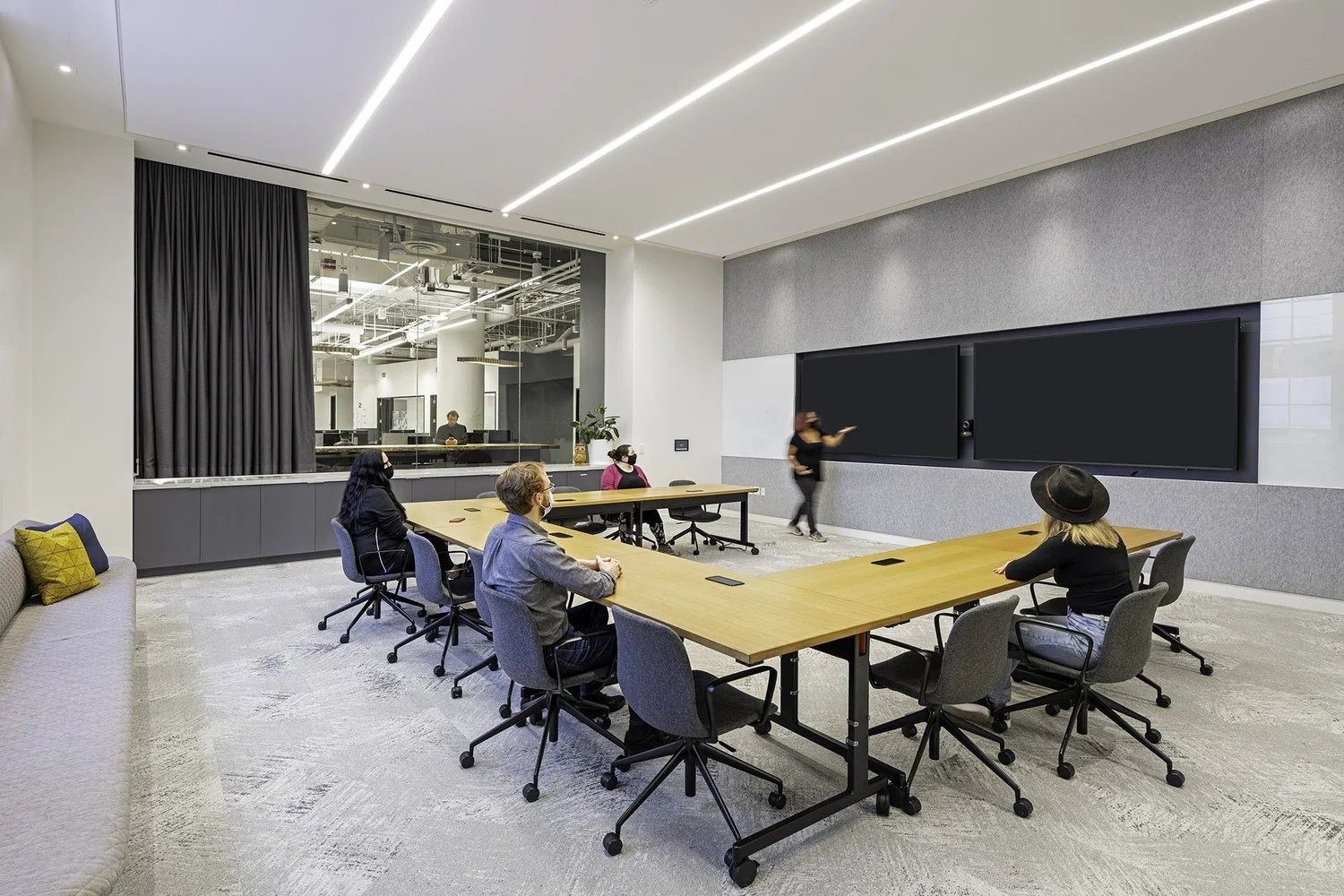 Twilio: Large training room with long tables and screens