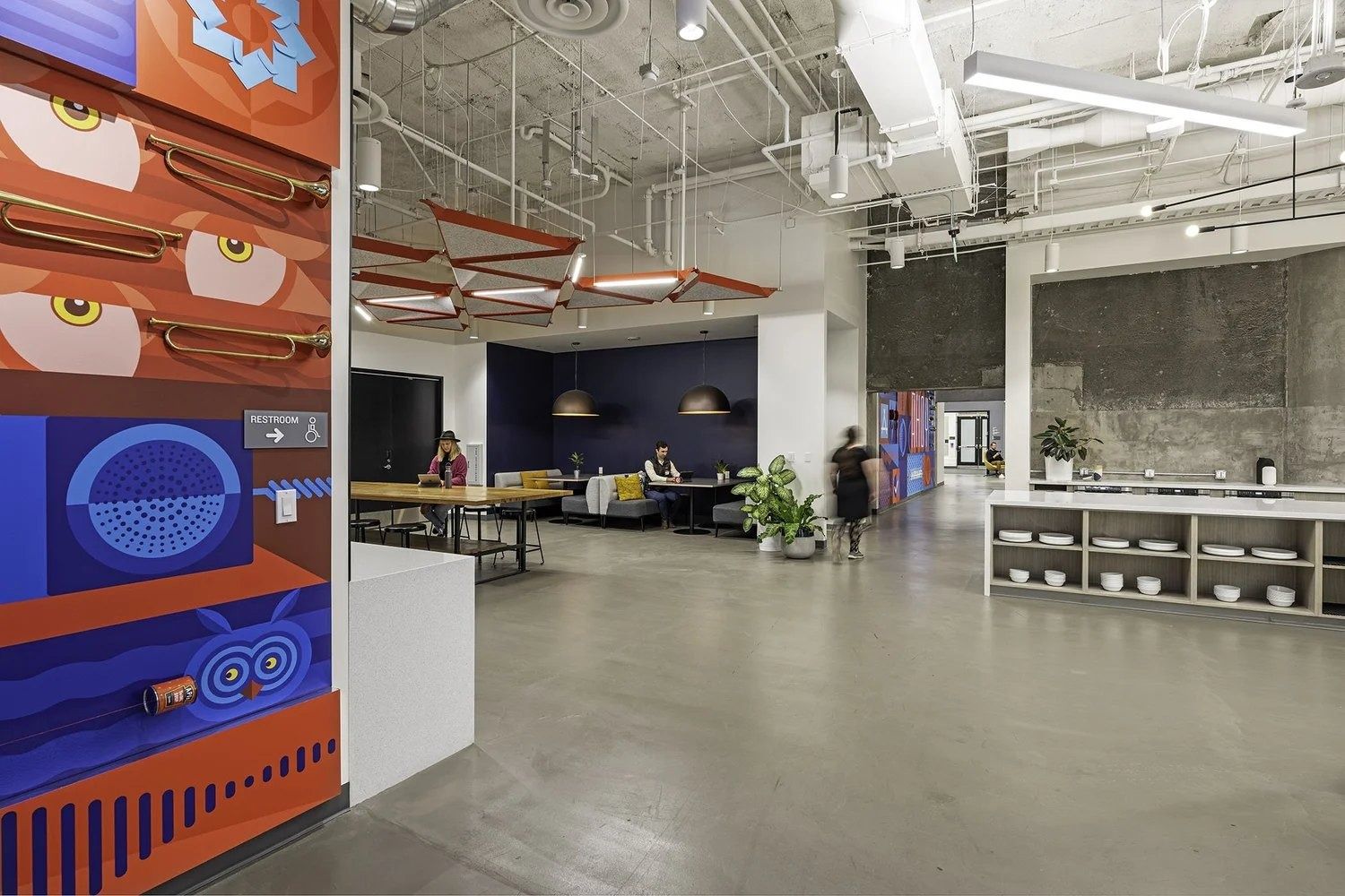 Twilio: Open floor with bold red and blue wall graphics